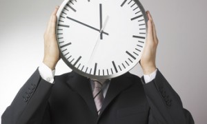 visage d'homme d'affaires horloge